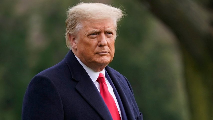 In this Dec. 12, 2020, file photo President Donald Trump walks on the South Lawn of the White House in Washington before boarding Marine One. Unemployment benefits for millions of Americans struggling to make ends meet were set to lapse at midnight Saturday night unless Trump signed an end-of-year COVID relief and spending bill that had been considered a done deal before his sudden objections.