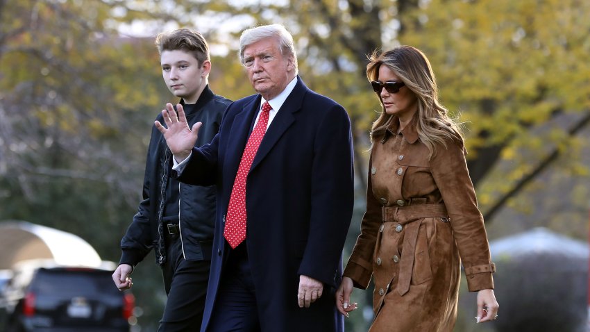 WASHINGTON, DC – NOVEMBER 26: U.S. President Donald Trump, first lady Melania Trump and their son Barron Trump walk across the South Lawn before leaving the White House on board Marine One November 26, 2019 in Washington, DC. Trump is traveling to Florida for a campaign rally and is scheduled to spend the Thanksgiving holiday at his private Mar-a-Lago Club. (Photo by Chip Somodevilla/Getty Images)