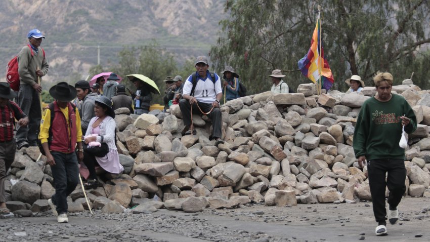 PAROTANI, BOLIVIA – OCTOBER 31: Supporters of former Bolivian President Evo Morales participate in the road blockade installed on the Pirqe Parotani bridge calling for the resignation of President Luis Arce Catacora, in Parotani, Bolivia on October 31, 2024. (Photo by Alexis Gomez/Anadolu via Getty Images)